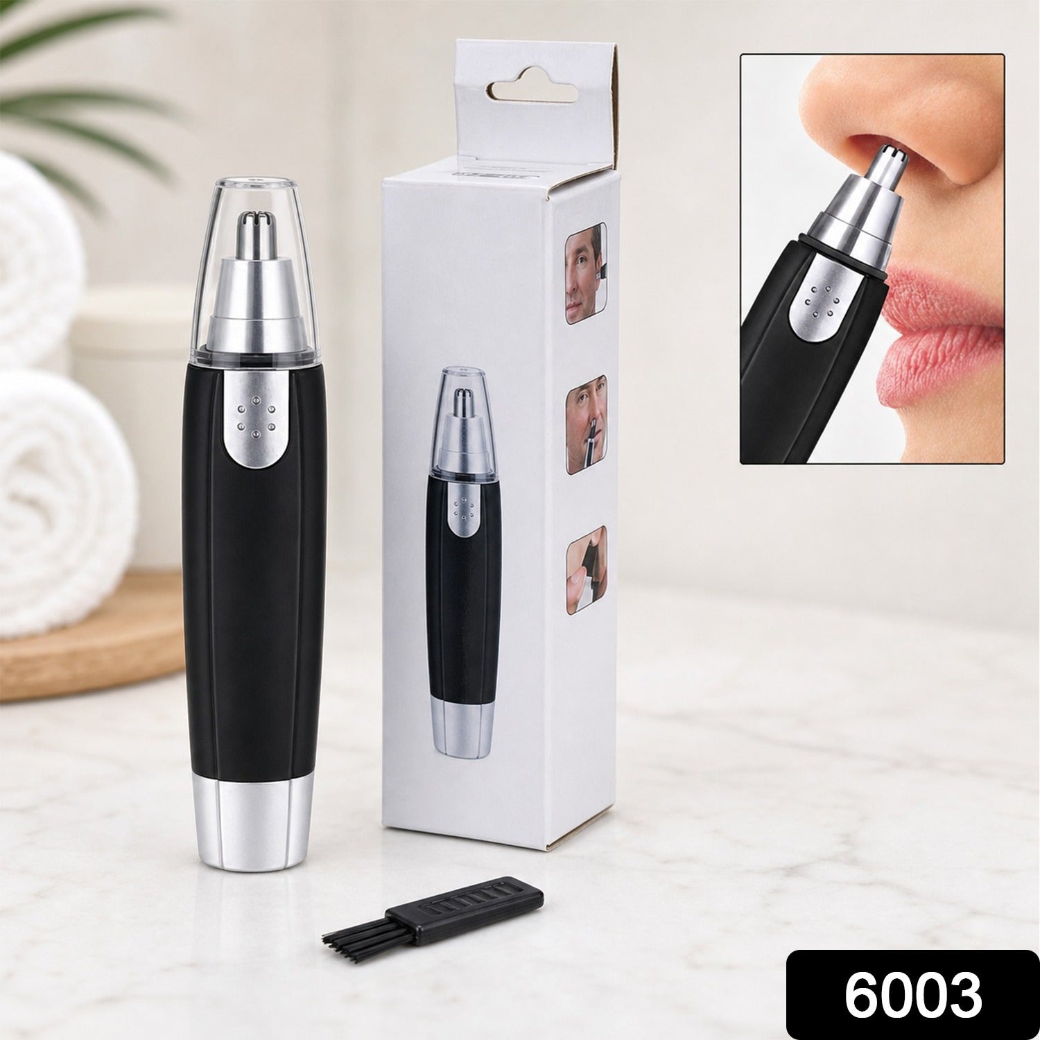 Close-up of the ear and nose hair trimmer showing its precise stainless steel blade.