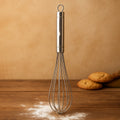 Medium stainless steel hand whisk with ergonomic grip front view