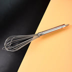 Metal hand whisk with polished stainless steel wires for aeration