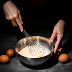 Another angle showing ergonomic handle of stainless steel whisk