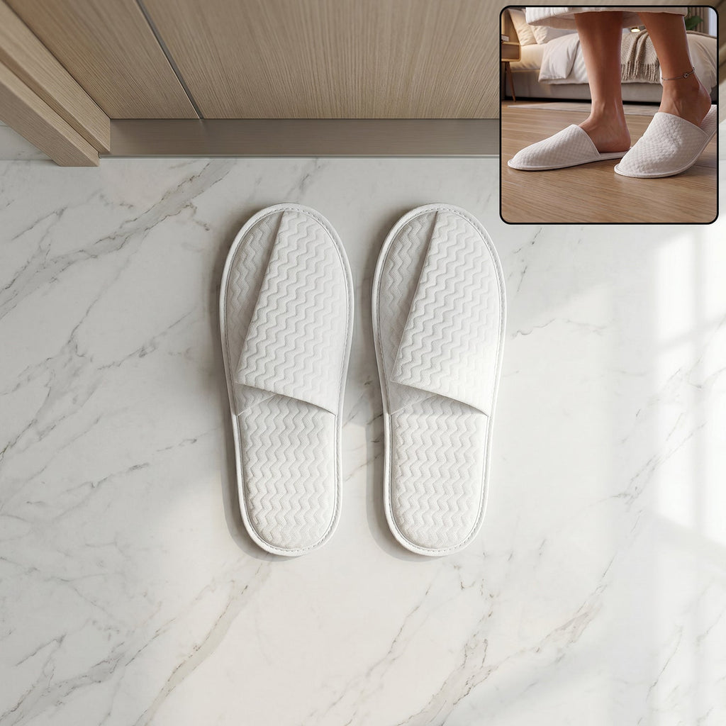 Hotel style white slippers for guest rooms