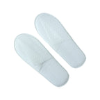 White bedroom slippers with cushioned soles and anti-slip base