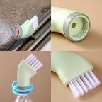 Close-up of connectable cleaning brush showing built-in scraper attachment