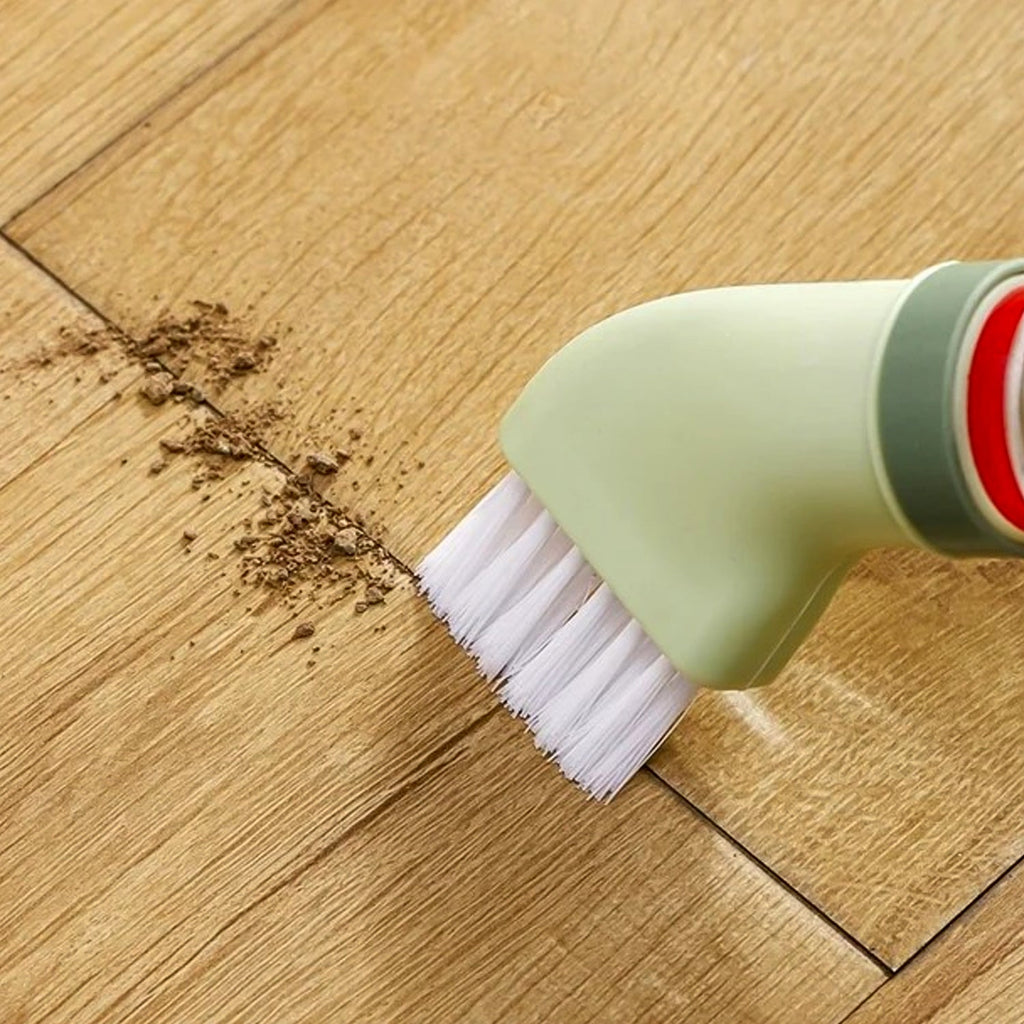 Compact cleaning brush with integrated scraper ideal for corners and tight spaces