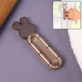 Self stick cabinet handle attached to a smooth cabinet door