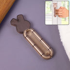 Self stick cabinet handle attached to a smooth cabinet door
