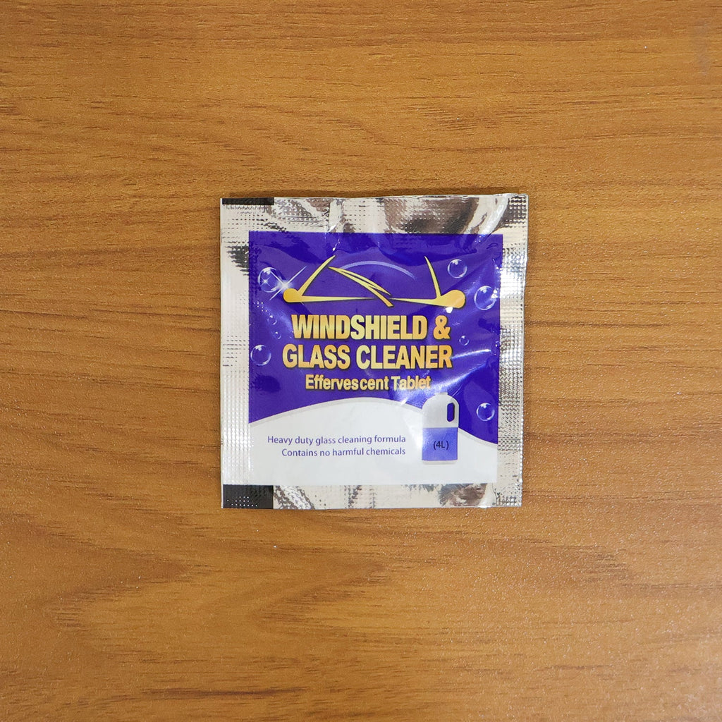 Single piece car windshield cleaning effervescent tablet