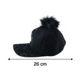 Side view of trendy winter baseball cap with pom pom