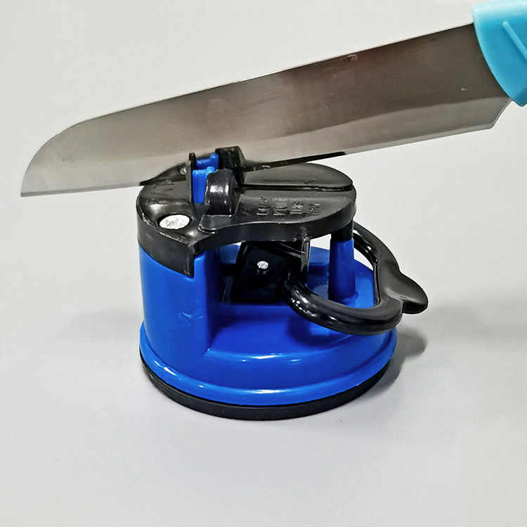 Efficient kitchen knife sharpener with a secure suction cup mount.