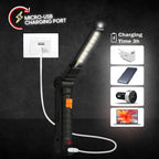 Portable rechargeable LED work light with magnetic base attached to metal surface