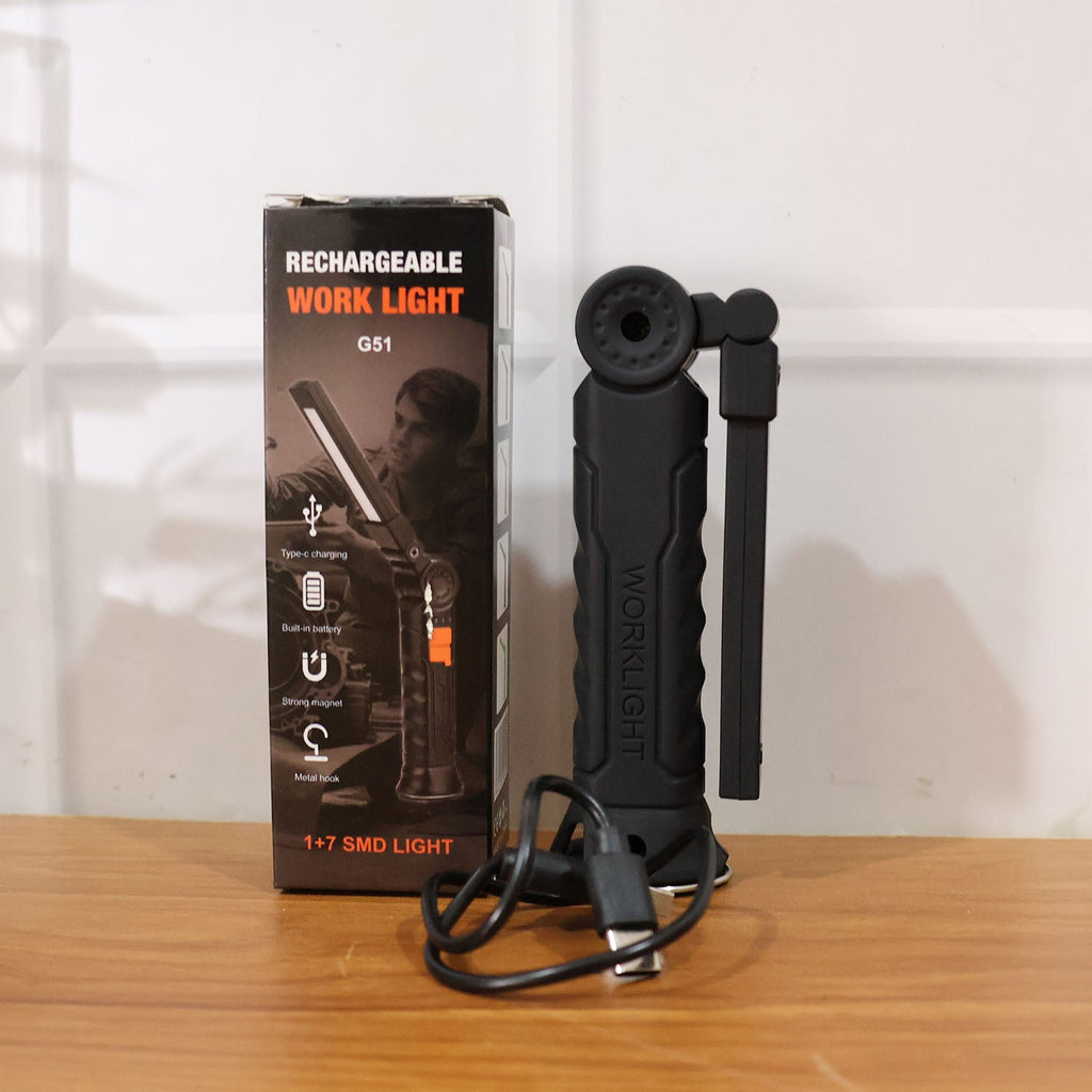 Close-up of rechargeable LED work light in use for home repair tasks