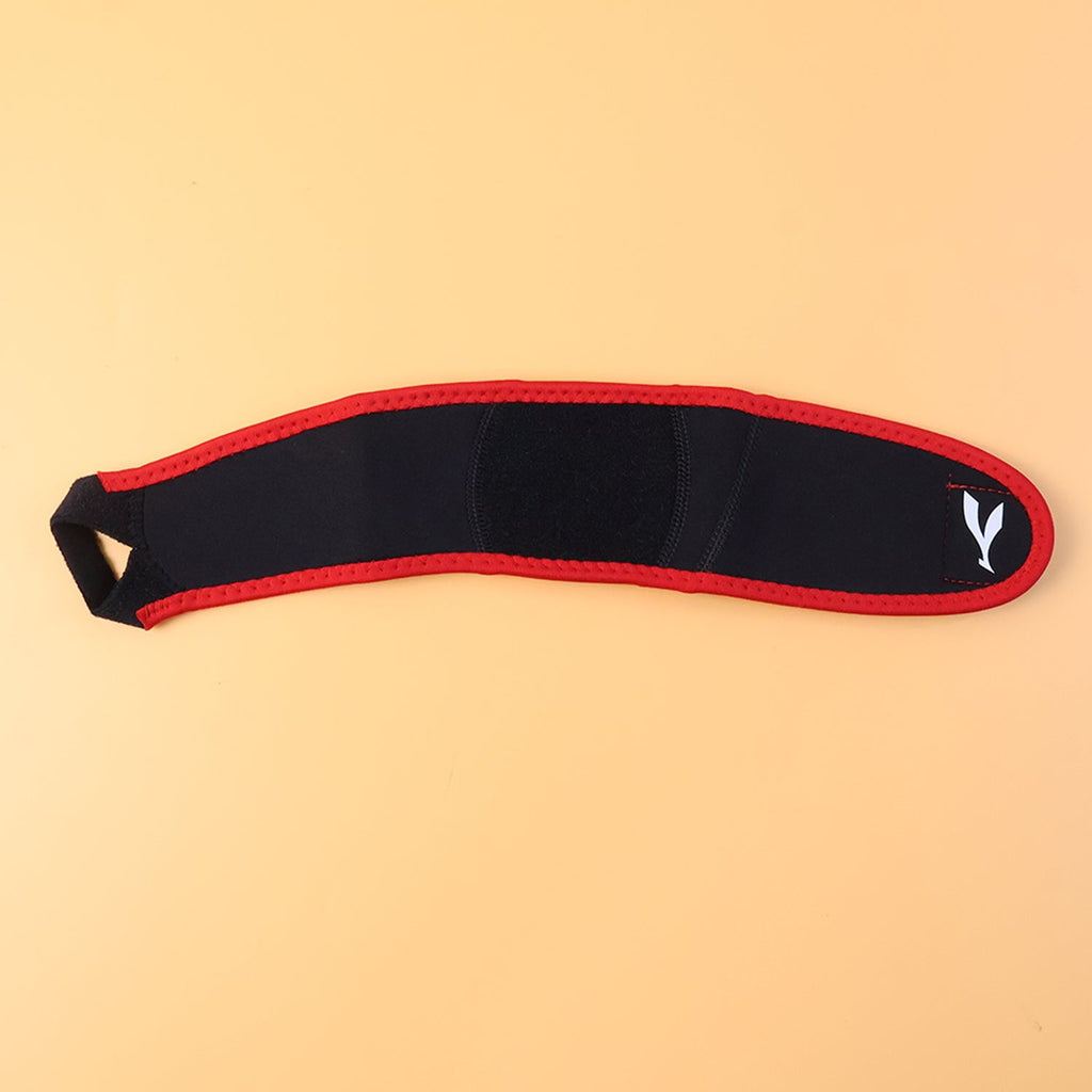 Person wearing adjustable wrist support brace during physical activity