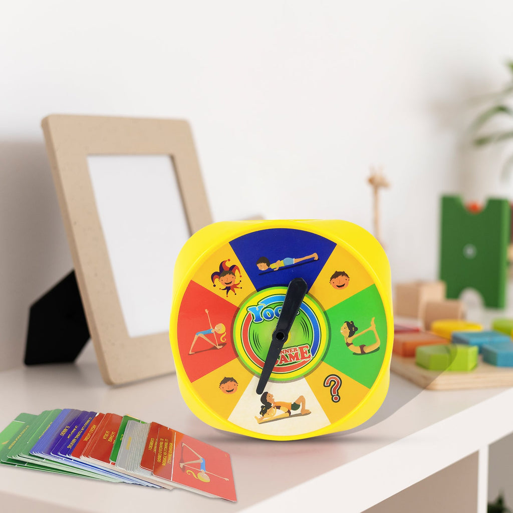 Family playing the Yoga Spinner Game for balance and flexibility