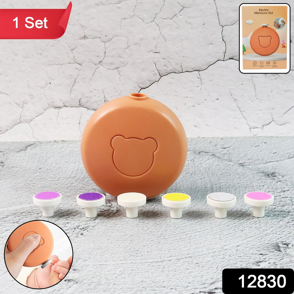 Close-up of the electric baby nail trimmer showing its six different grinding heads.