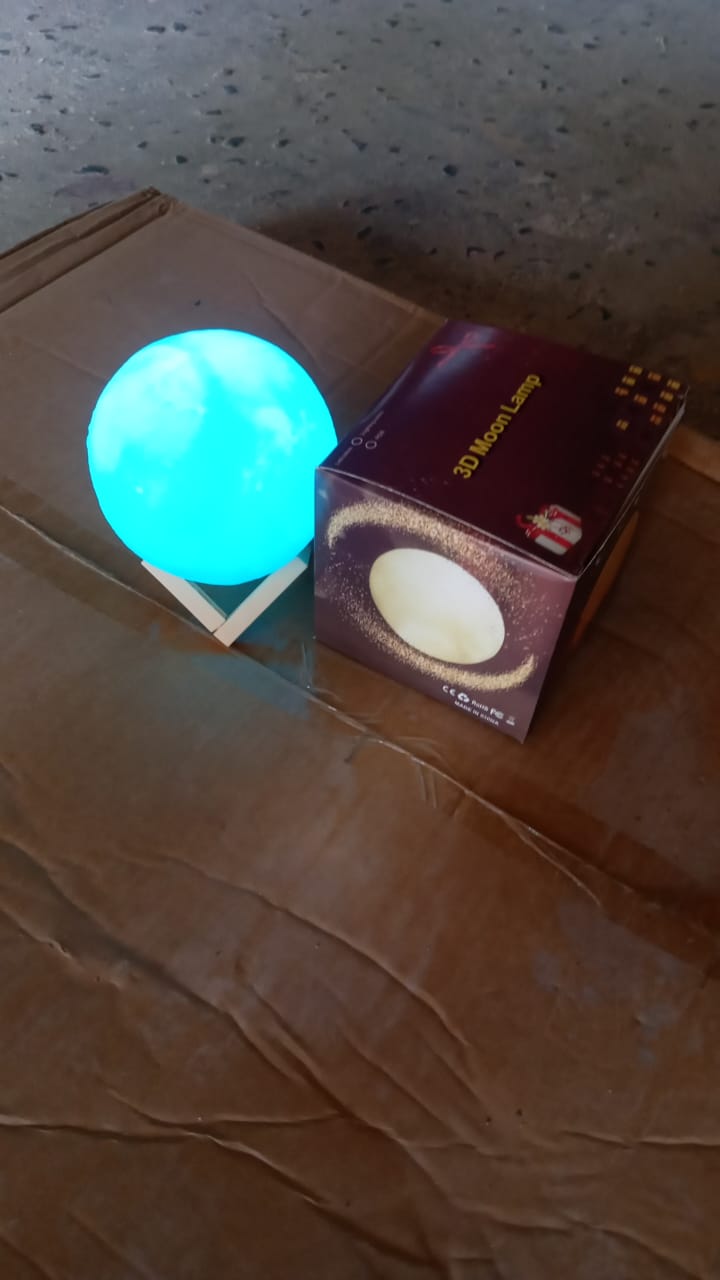 The realistic texture of the blue Moon Night Lamp, designed to mimic the lunar surface.