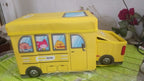 The School Bus Toy Storage Box folded flat, highlighting its space-saving and portable design.