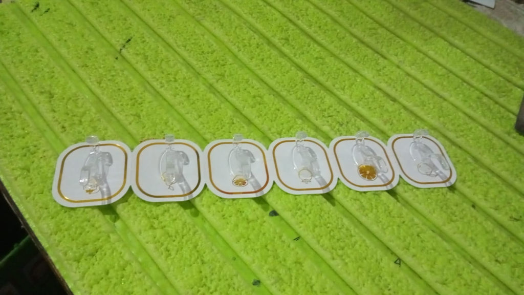 Multiple transparent adhesive hooks used to organize various items in a modern home setting.