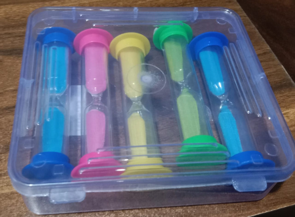 The complete set of five plastic sand timers displayed in their original retail packaging.