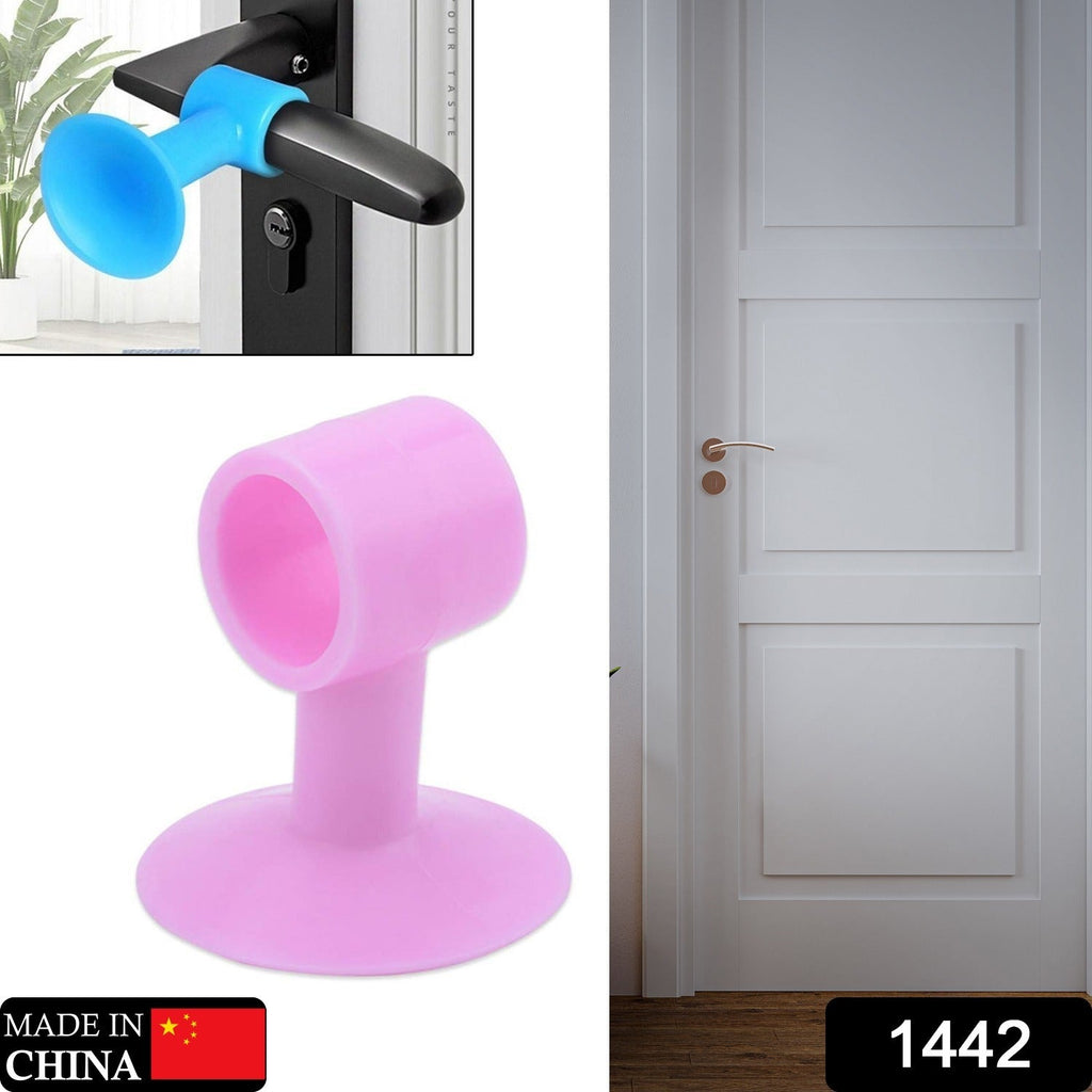 Mini silicone door stopper attached to door handle preventing wall damage