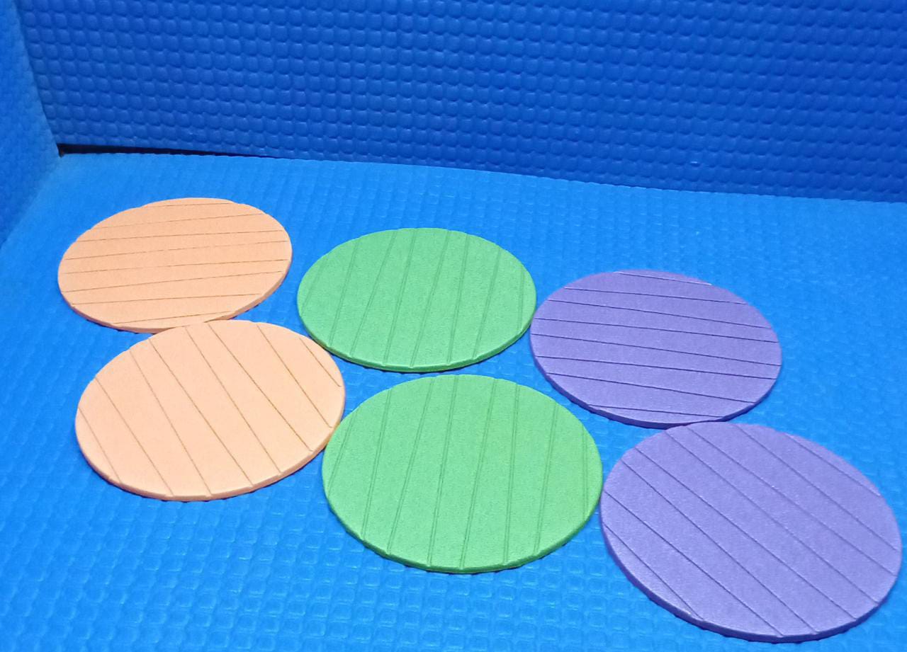 Lifestyle shot of Styleva's round silicone coasters in a modern home setting.