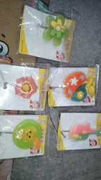 Multipurpose frog-shaped self-adhesive wall hook enhancing bathroom organization.