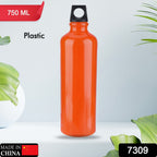 Person holding the lightweight 750ml plastic water bottle, demonstrating its ergonomic grip.