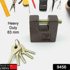 Close-up of the robust brass core visible within the black iron padlock.