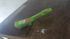 Durable scrubbing brush suitable for various household cleaning tasks.