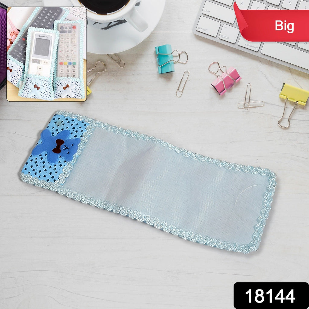 Soft cartoon fabric remote control case with decorative lace trim.
