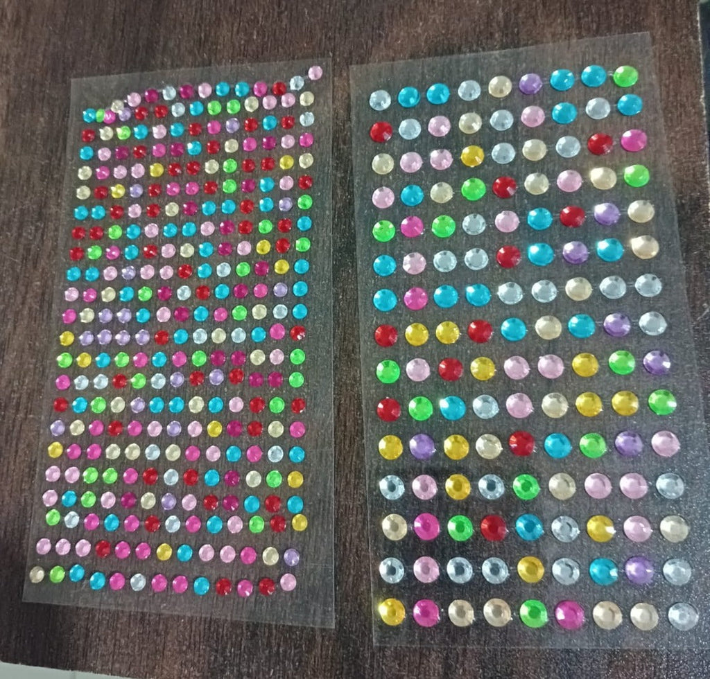 Display of multi-size self adhesive crystals for diverse art and craft projects.