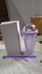Detailed view of the hard acrylic sipper bottle with a secure lid and straw.