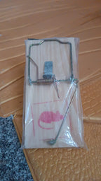 Compact wooden mouse trap ideal for flexible rodent control placement