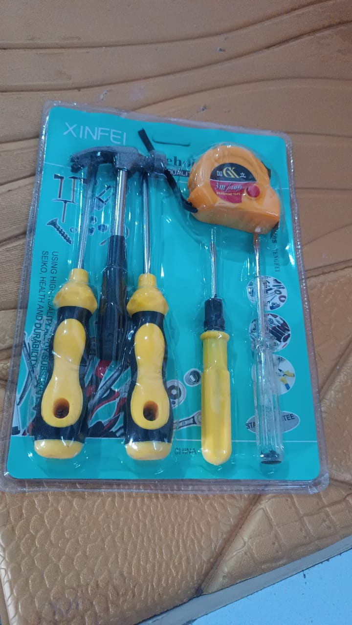 Close-up of hand tool kit components for household repairs