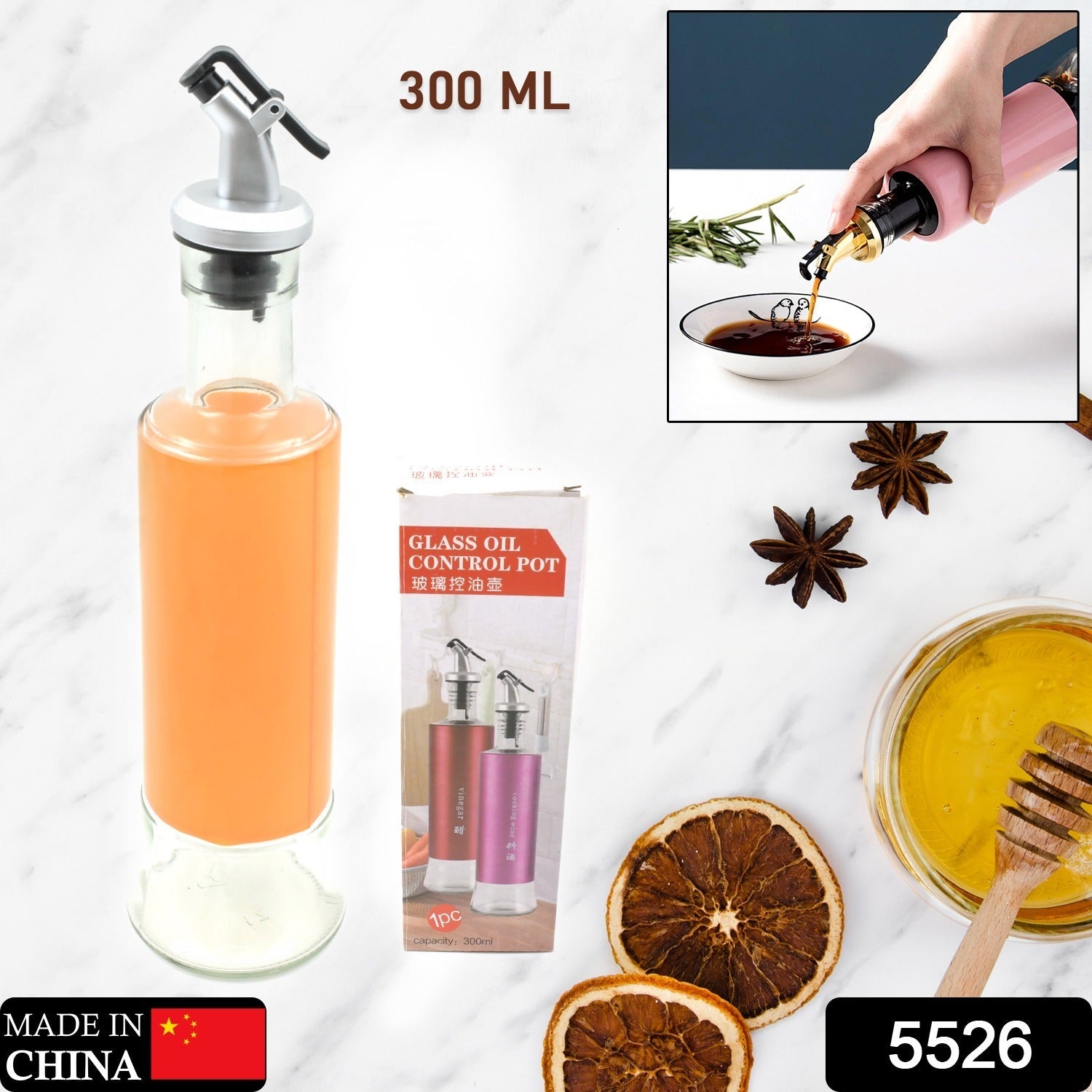 A close-up of the leakproof glass olive oil dispenser showcasing its sleek design and pouring mechanism.