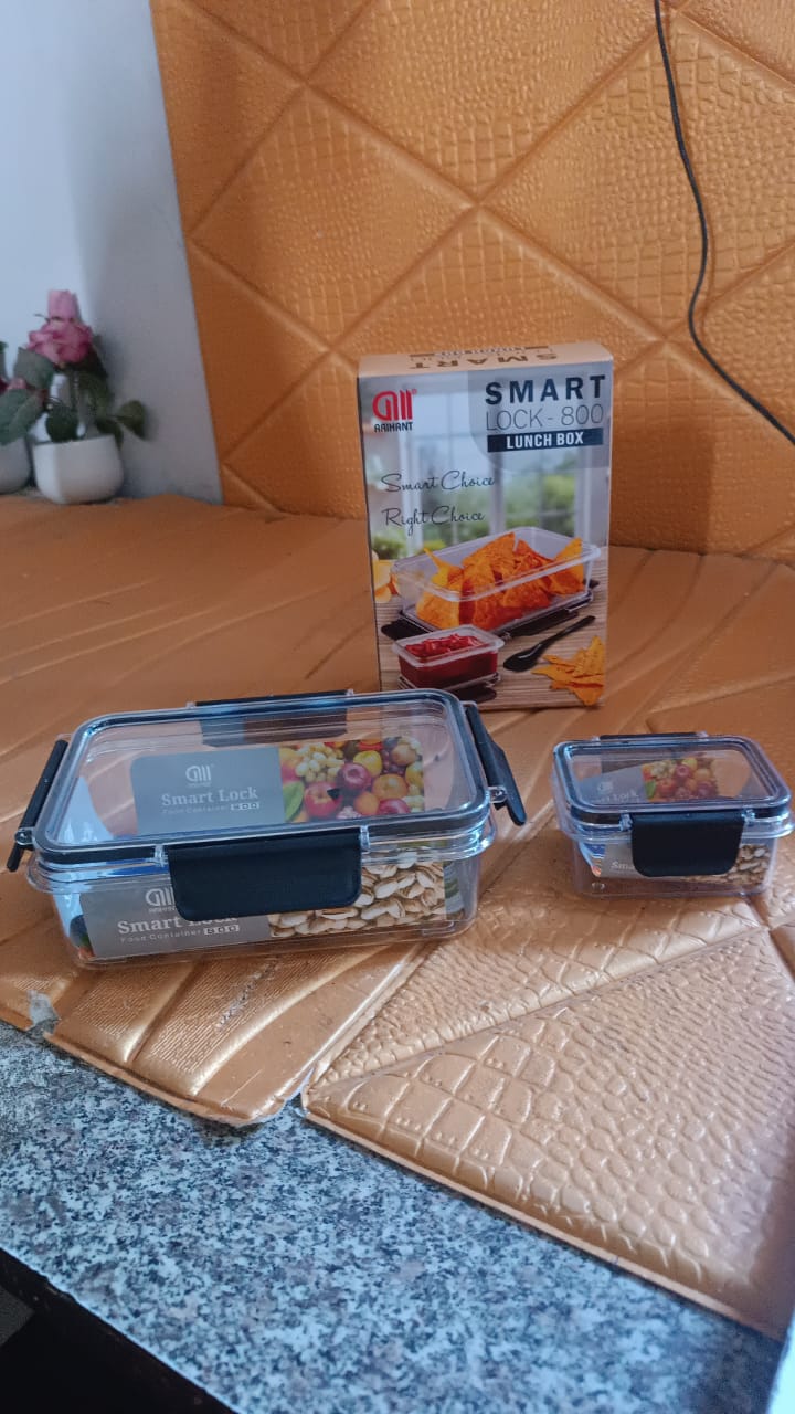 Plastic kitchen storage container set with secure locking lids and spoon