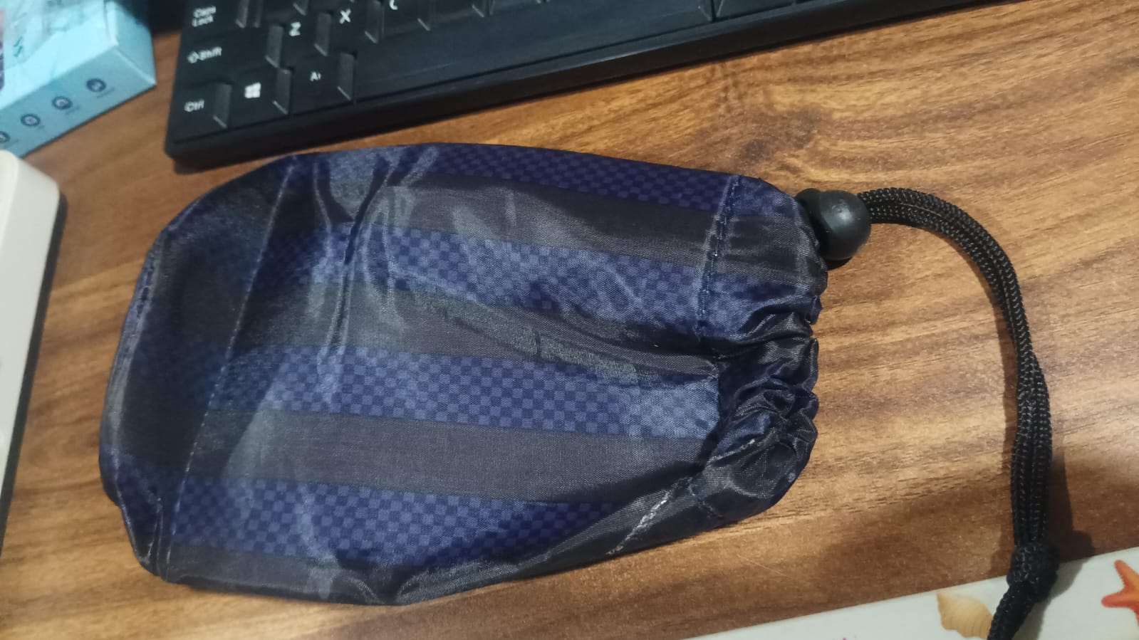 Empty washable rope pouch, ready to be filled with travel essentials.