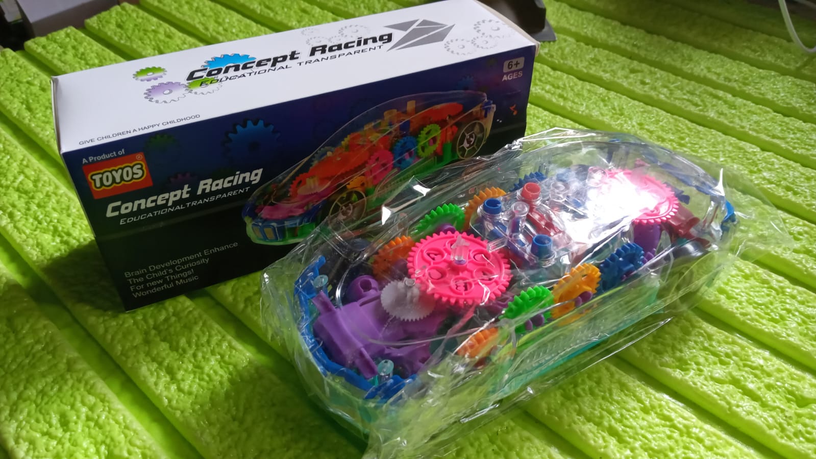 Retail packaging for the transparent gear car toy, perfect for gifting to kids.