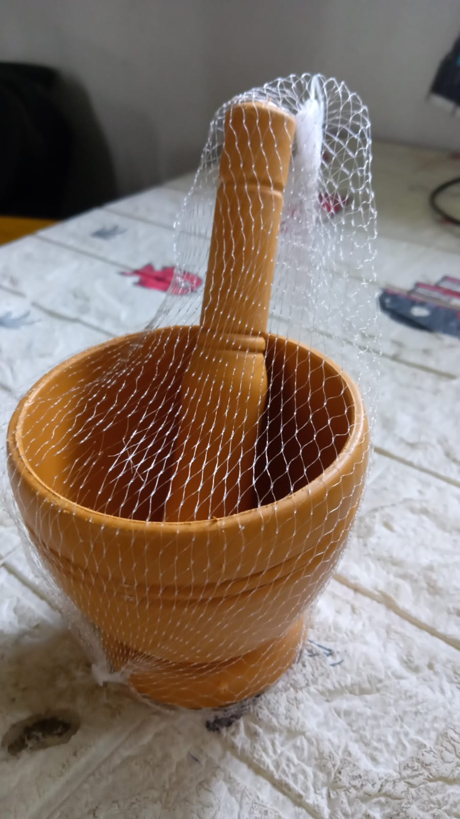 Side view of the efficient mortar and pestle, highlighting its compact design.