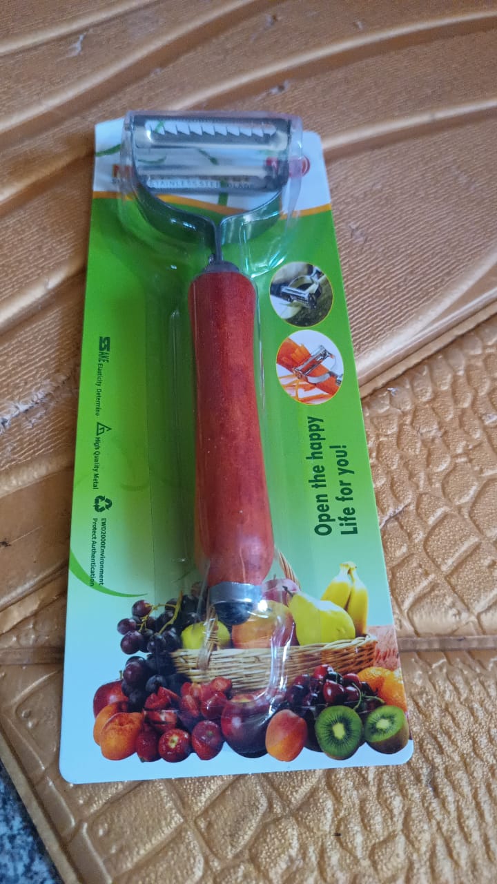 Multipurpose fruit and vegetable peeler featuring wooden handle and steel blade