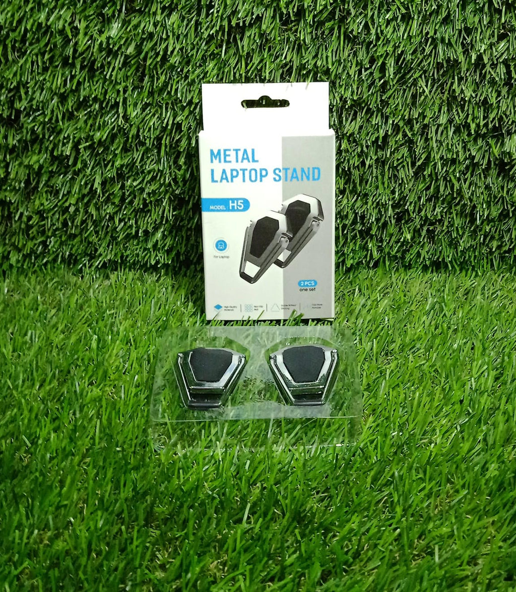 Versatile metal stand holding both a laptop and a tablet, showcasing its multi-device compatibility.