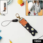 Short neck lanyard featuring floral pattern and metal clip hook for badges