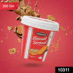 Jar of Caramelised Biscuit Spread from Chocotown, with a spoon scooping out a generous portion.