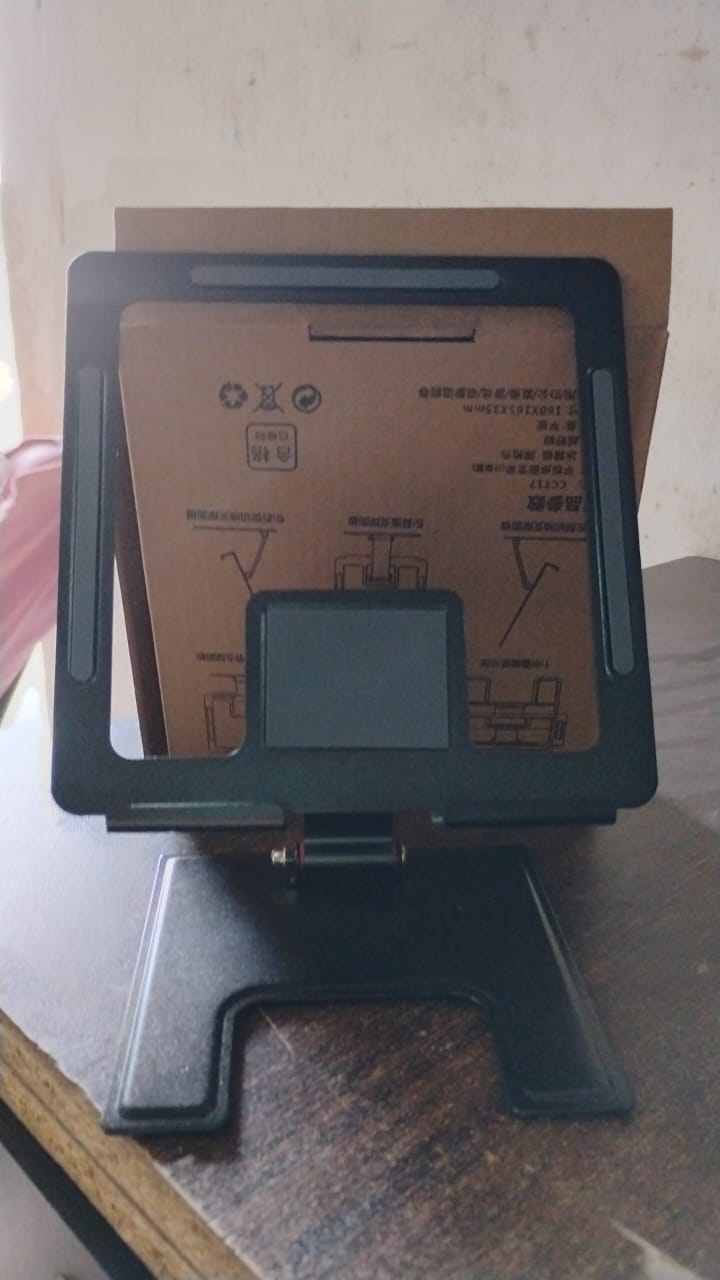 Sturdy and elegant foldable desktop stand, showcasing its minimalist design.