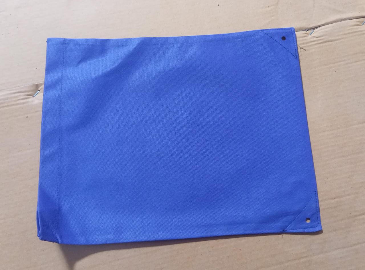 Versatile handle-free bag being used for carrying various grocery items.