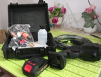 The wireless high-pressure spray gun ready for effective bike washing.