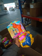 Child using elephant bubble gun toy outdoors fun play