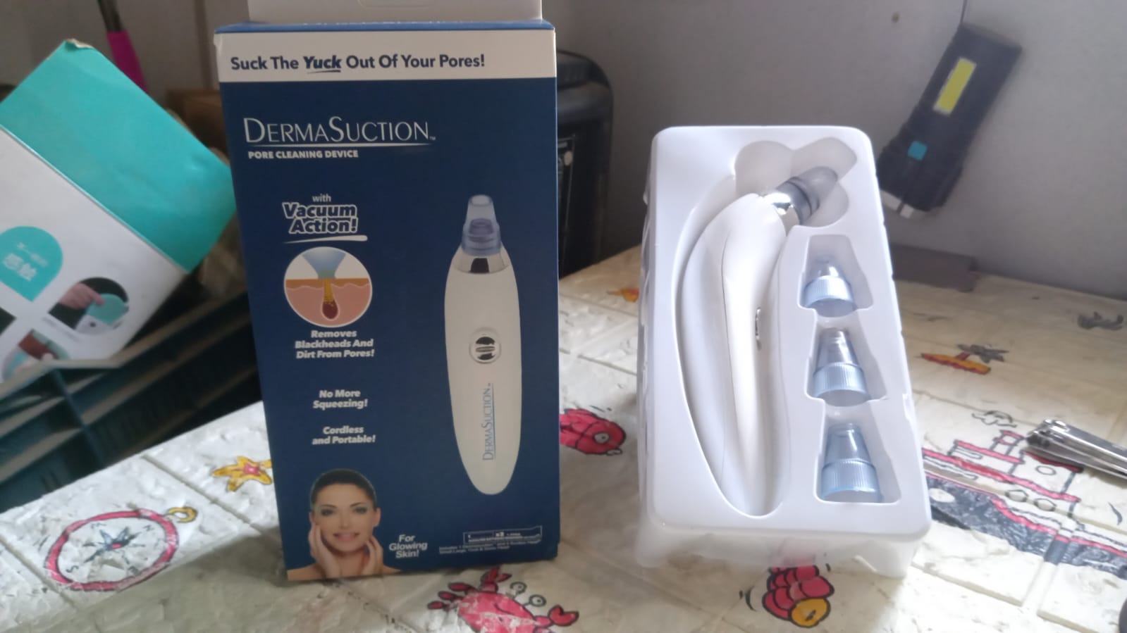 Lifestyle shot of the multifunctional acne and blackhead removal device in use.