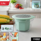 Handheld manual vegetable grater stripping corn kernels efficiently
