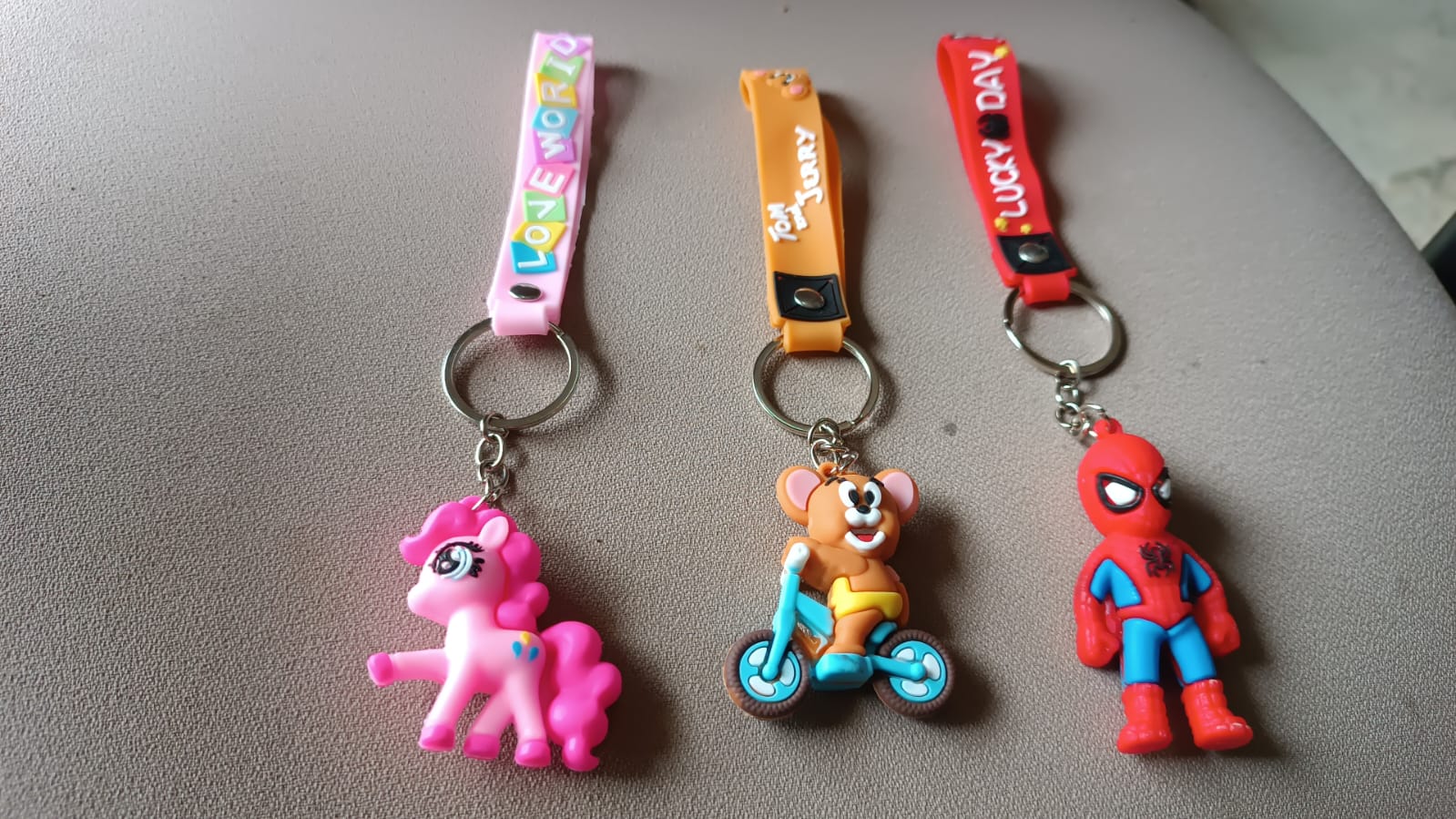 Front view of a specific cartoon character silicone keychain, highlighting its intricate 3D design.