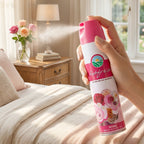 Rose air freshener spray bottle on white background